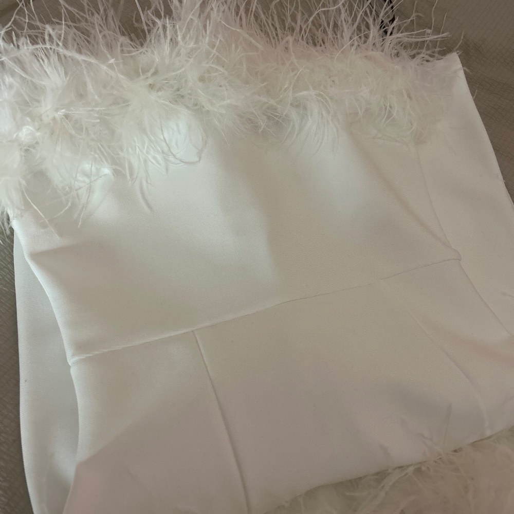 Beautiful and elegant white feathered dress